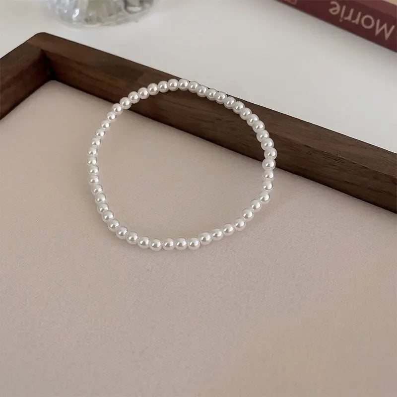 White Faux Pearl Beaded Bracelet — Adjustable Elastic